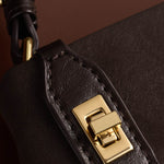 Orin Twist Lock Suedette Shoulder Bag | Bitter Chocolate | Small